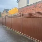 Brown Metal Fence with Contemporary 5 Trellis