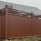 Brown Metal Fence with Contemporary Trellis